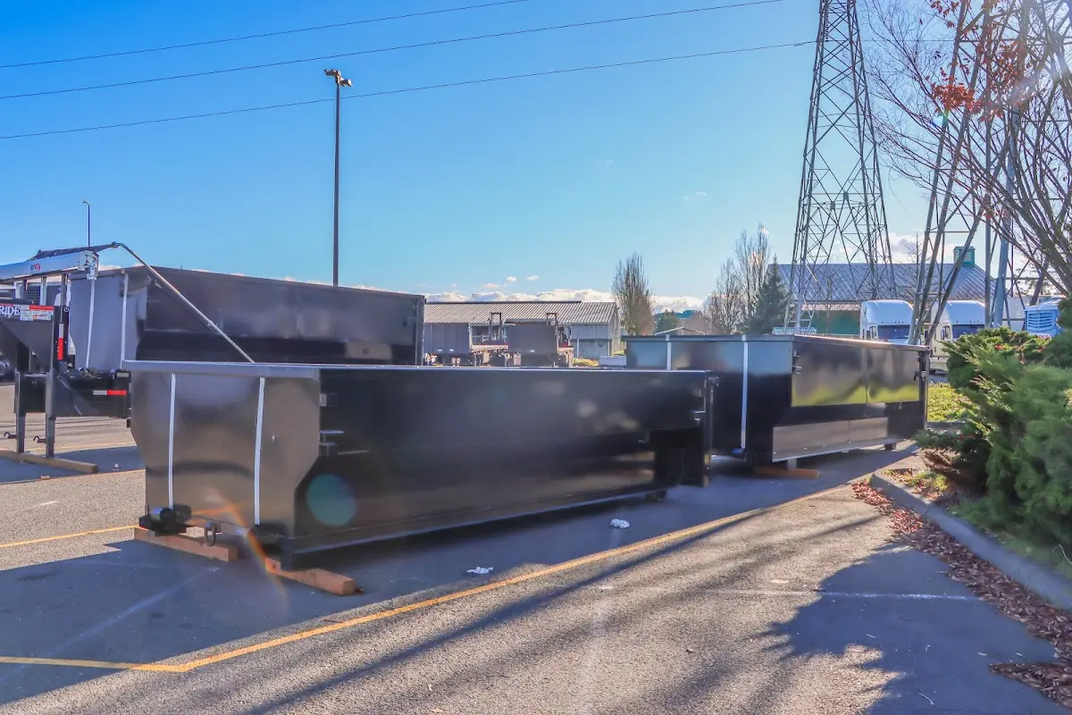 Roll-off dumpster ready for waste disposal at job site for Concrete Dumpster Rental in Rio del Mar